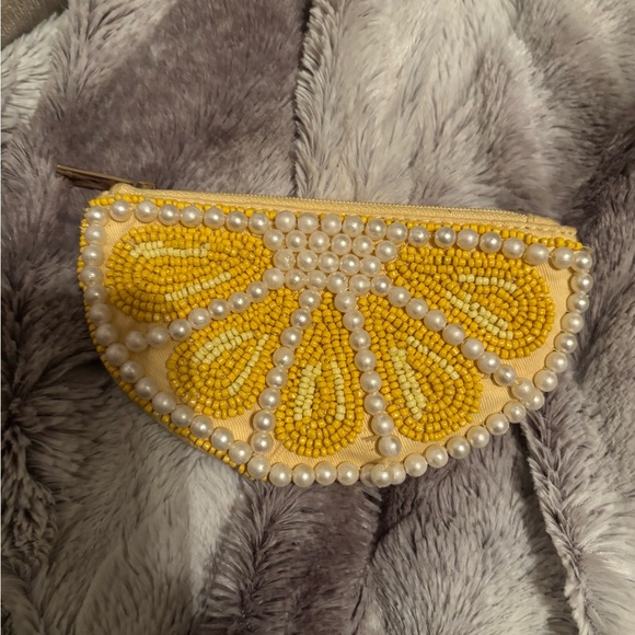 Kate Spade Patterson Drive Pebbled Emboss
Bag in Butter. With lemon coin purse - Picture 7 of 7